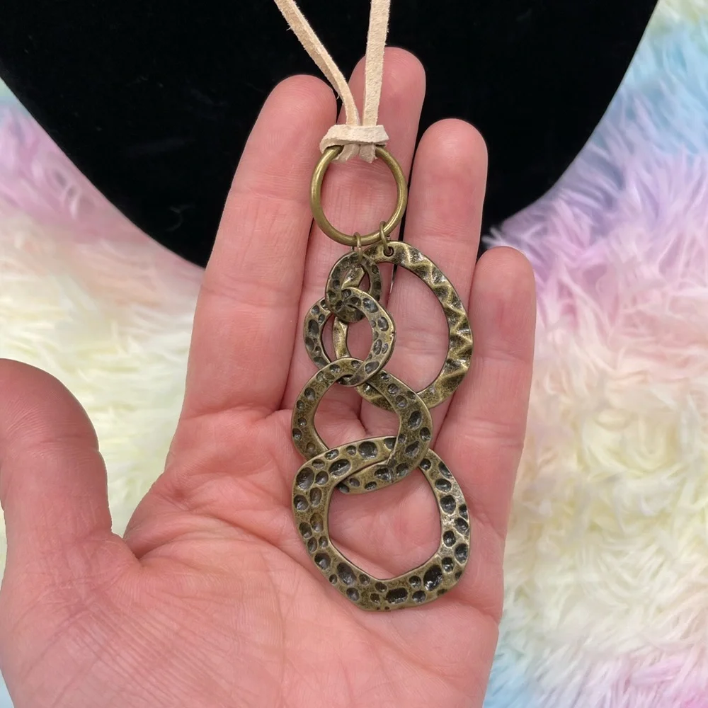 ➷ 5/$25 Hammered Metal Statement Piece on Leather Cord - Picture 2 of 3